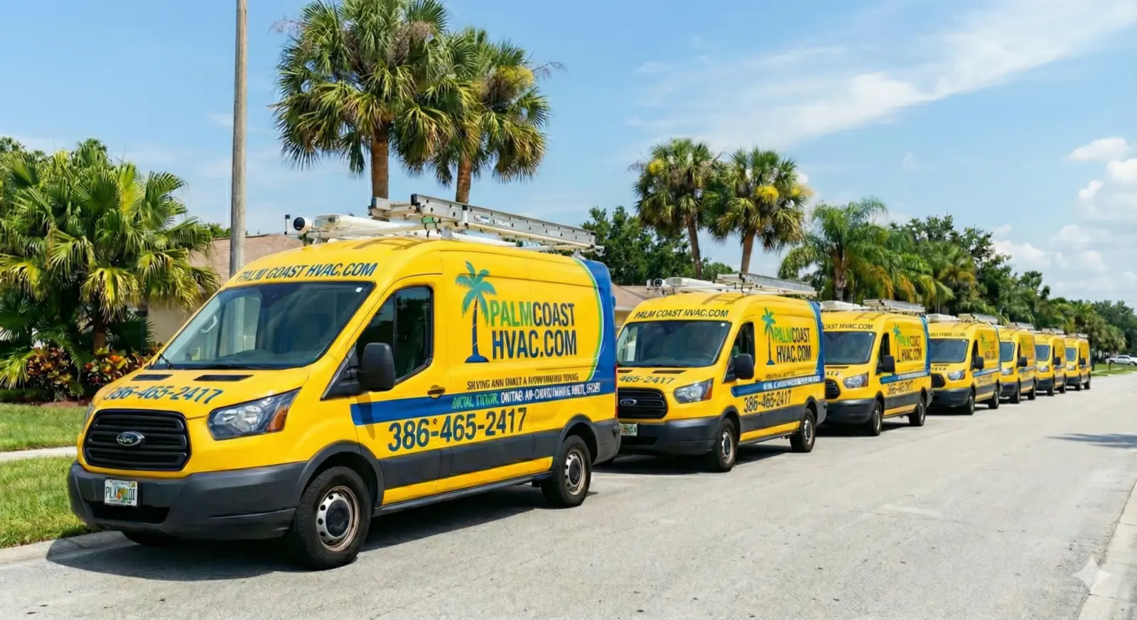 Fleet of Palm Coast HVAC R LLC yellow and blue service vans parked on a Palm Coast street